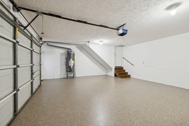 garage with a garage door opener and gas water heater