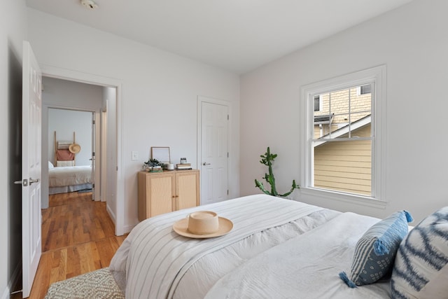 bedroom featuring light wood finished floors