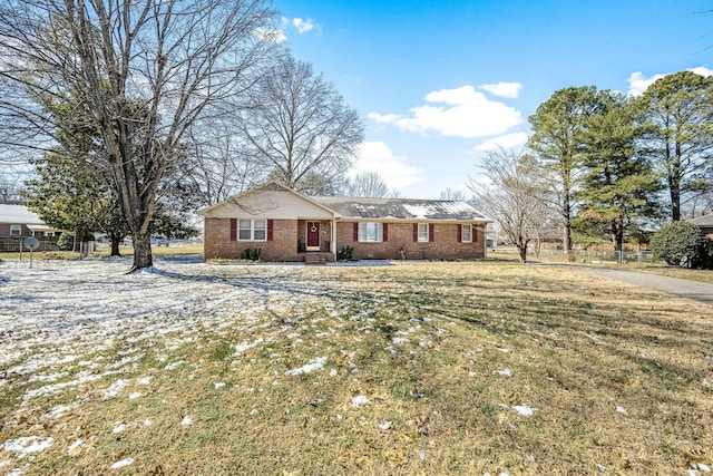 single story home with brick siding