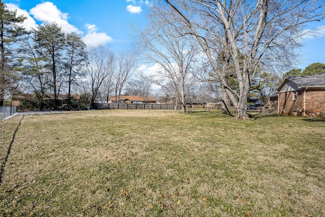 view of yard with fence