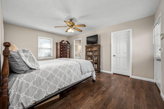 bedroom with a ceiling fan, ensuite bath, baseboards, and dark wood-style flooring