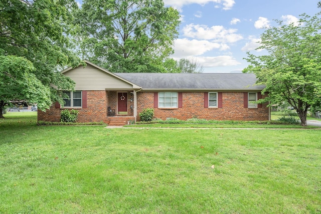 911 Squire Ct, Murfreesboro, TN 37129 - ranch-style house with a shingled roof, brick siding, and a front lawn