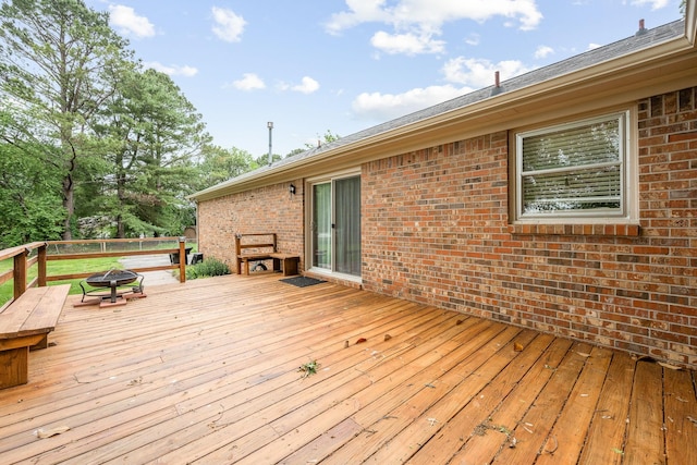 911 Squire Ct, Murfreesboro, TN 37129 - wooden terrace with a fire pit