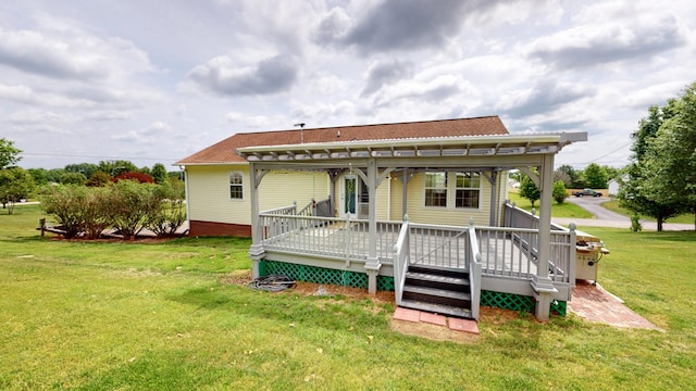 back of house with a yard and a wooden deck