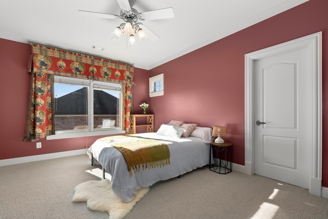 bedroom featuring light carpet, baseboards, visible vents, and ornamental molding