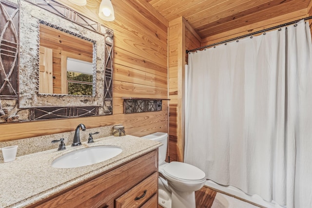 full bath featuring toilet, wood ceiling, wooden walls, and vanity