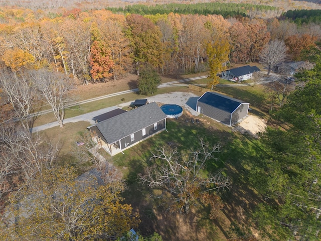 aerial view with a wooded view