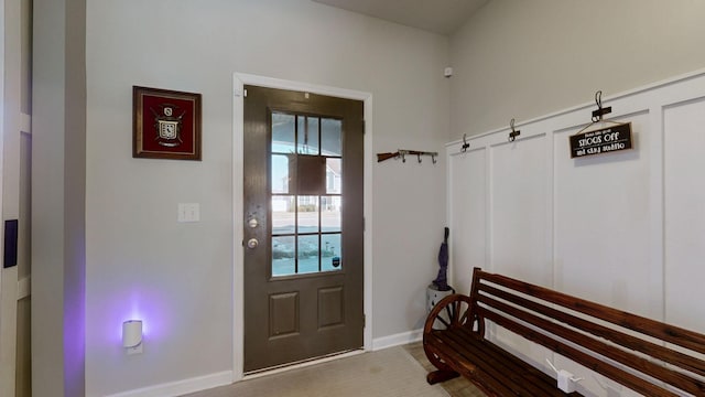 entryway featuring baseboards and a healthy amount of sunlight