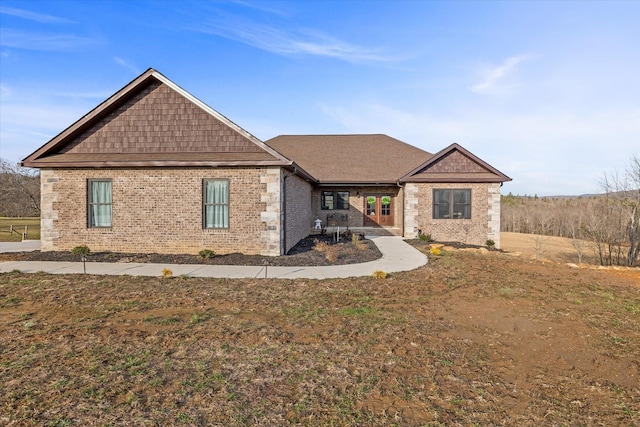 view of front of house with brick siding