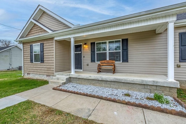 view of front facade featuring a porch and crawl space