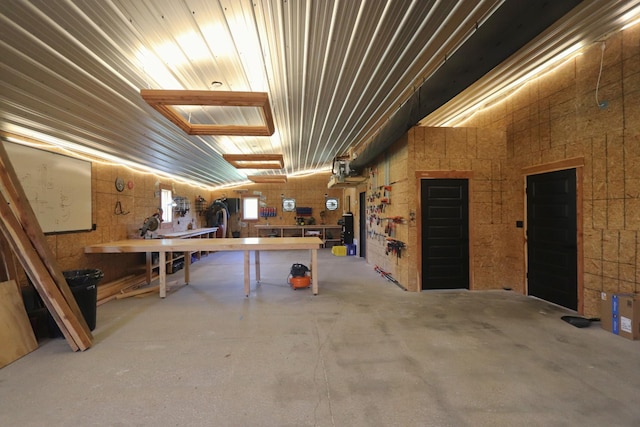 basement with a workshop area