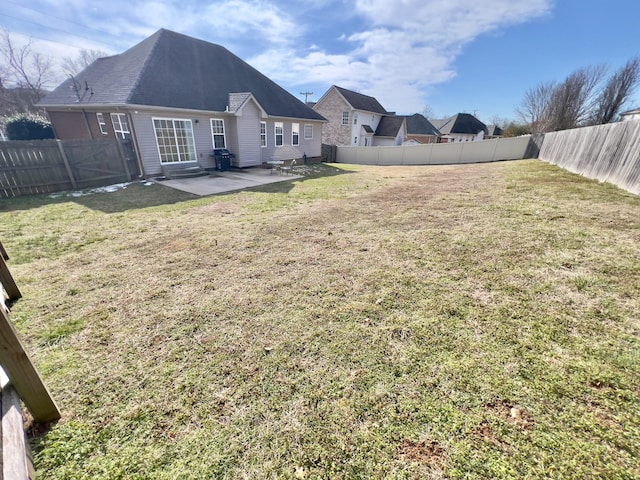 view of yard featuring a fenced backyard and a patio