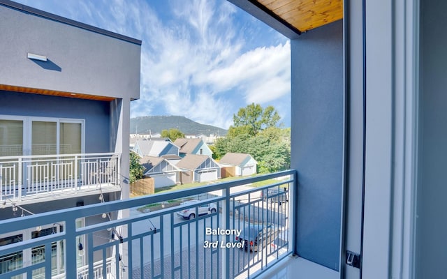 balcony featuring a mountain view