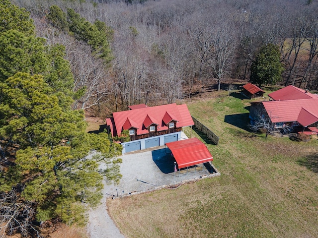 drone / aerial view featuring a forest view