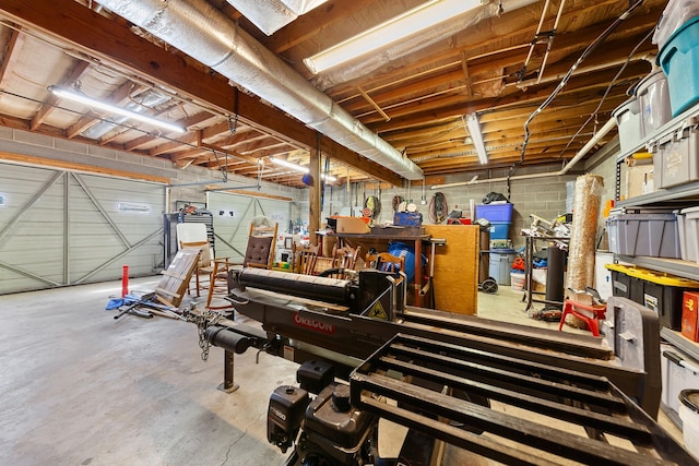 garage featuring concrete block wall