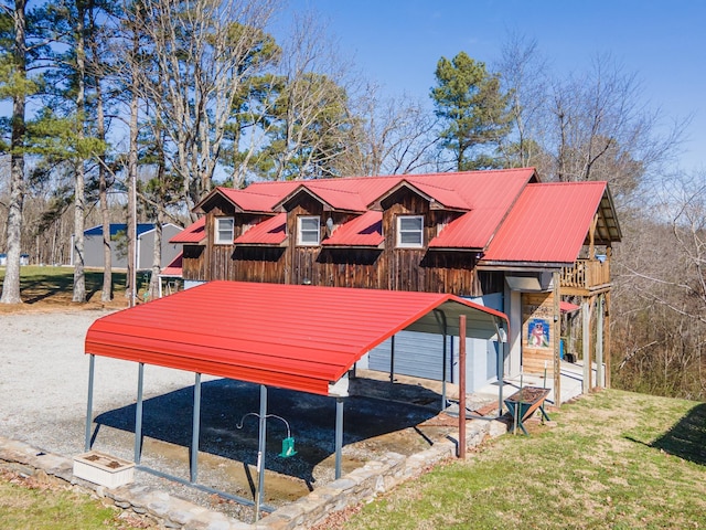 exterior space featuring metal roof