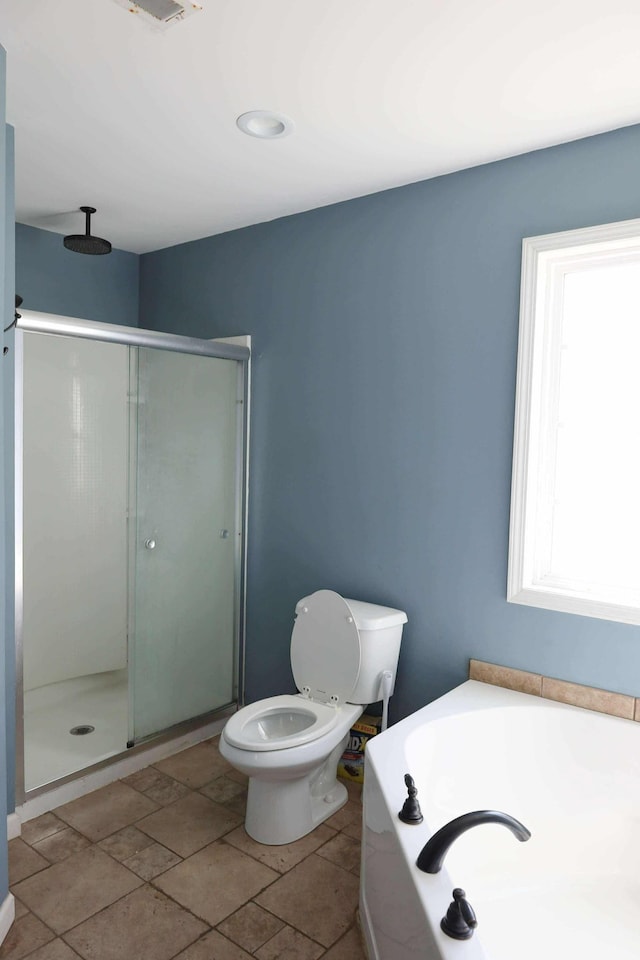 1335 Bumpus Mills Rd, Dover, TN 37058 - bathroom with a shower stall, a bath, and a healthy amount of sunlight