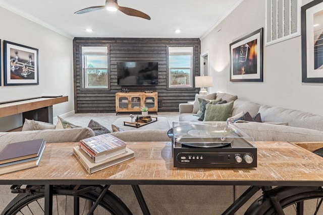 living room featuring recessed lighting, visible vents, crown molding, and ceiling fan