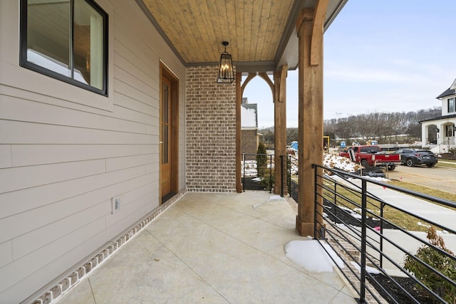 balcony featuring covered porch