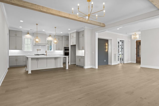 unfurnished living room with baseboards, ornamental molding, wood finished floors, beam ceiling, and recessed lighting