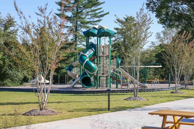 communal playground with a lawn