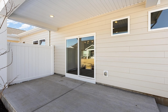 view of patio / terrace featuring fence