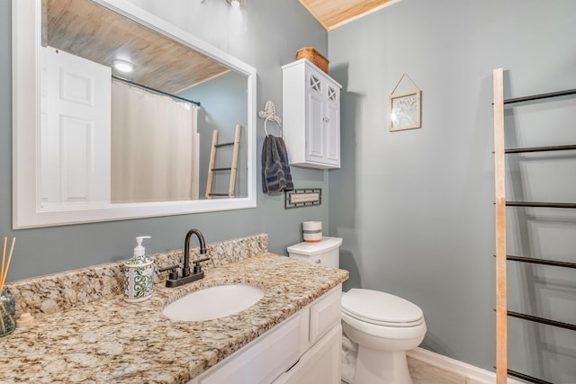 full bathroom with toilet, a shower with shower curtain, and vanity