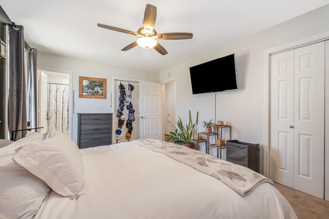 carpeted bedroom with ceiling fan