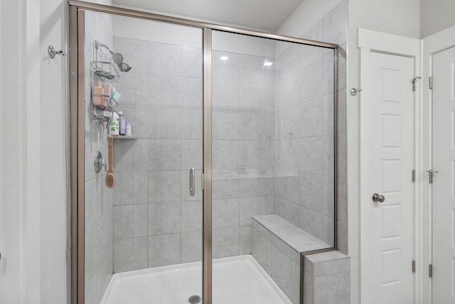 full bathroom with a stall shower