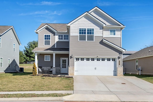 craftsman-style home featuring a porch, a front yard, central AC, a garage, and driveway