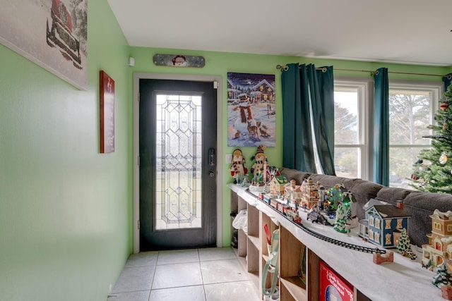 entrance foyer with light tile patterned floors