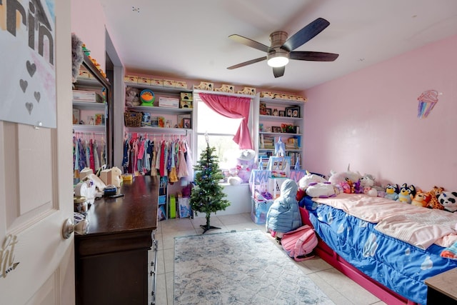 bedroom featuring light tile patterned floors and ceiling fan