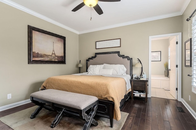 bedroom featuring dark wood-style floors, ornamental molding, and baseboards