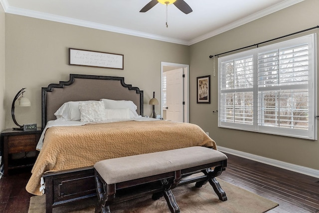 bedroom with ceiling fan, crown molding, baseboards, and wood finished floors