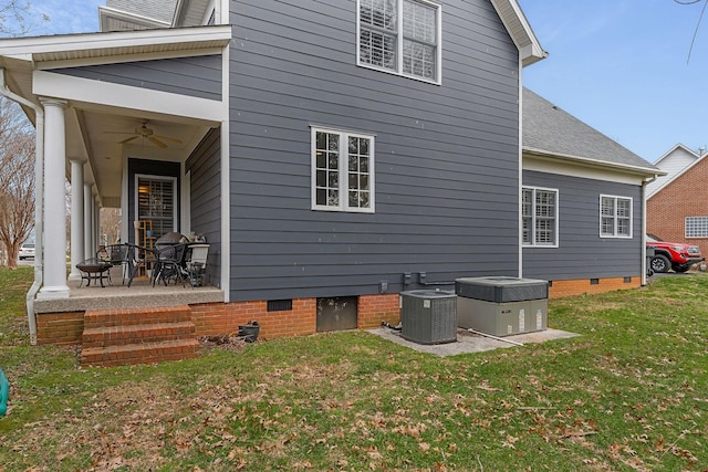 back of property featuring crawl space, a patio area, a ceiling fan, and central AC