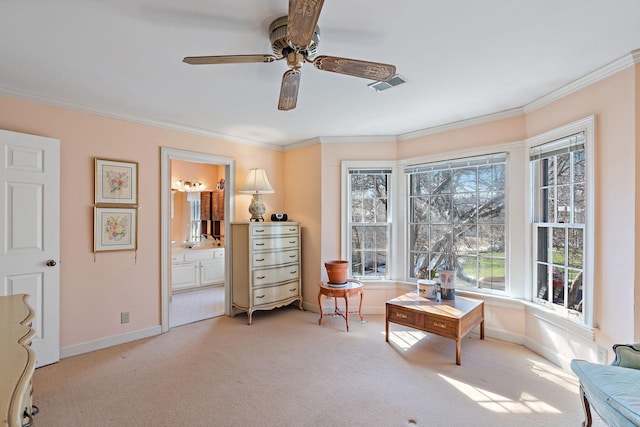 living area featuring ornamental molding, light colored carpet, visible vents, and baseboards