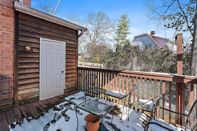 view of snow covered deck