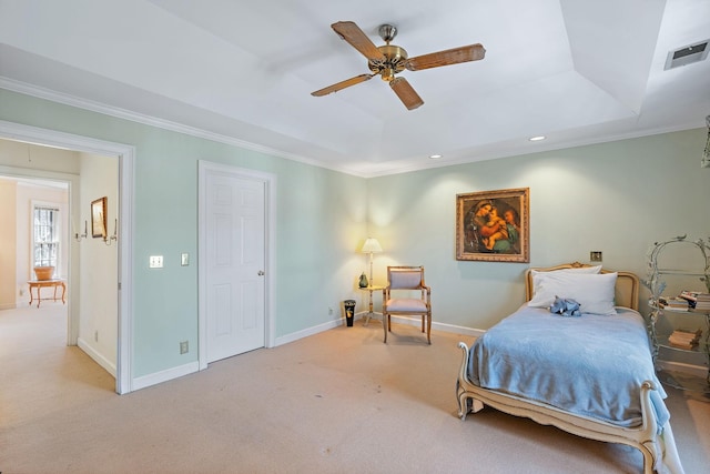 bedroom with light colored carpet, visible vents, crown molding, and baseboards