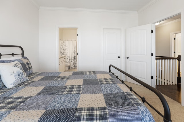 unfurnished bedroom featuring ornamental molding and ensuite bathroom