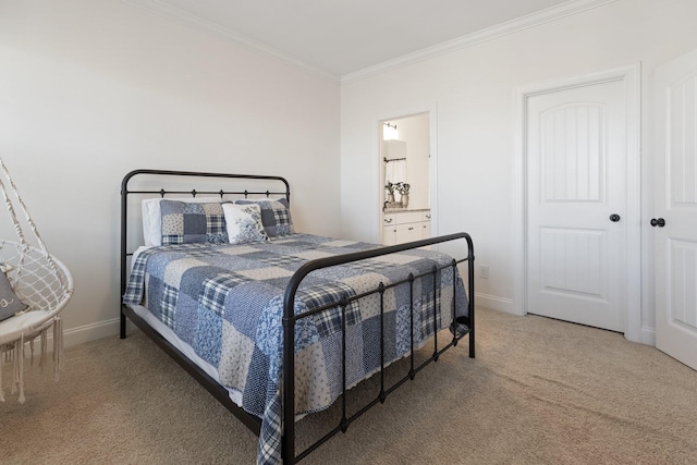 carpeted bedroom featuring baseboards and ornamental molding