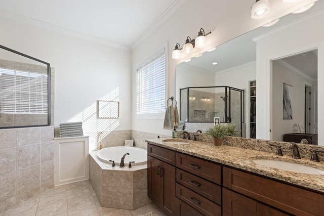 full bath featuring crown molding, a sink, a shower stall, and tile patterned floors