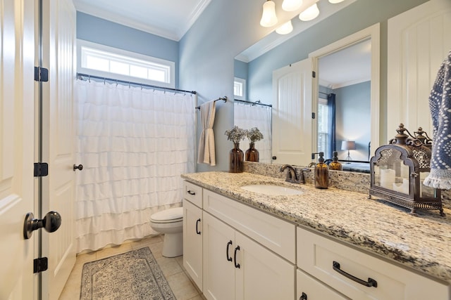 bathroom with toilet, ornamental molding, vanity, and tile patterned floors