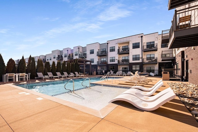 pool featuring a patio area