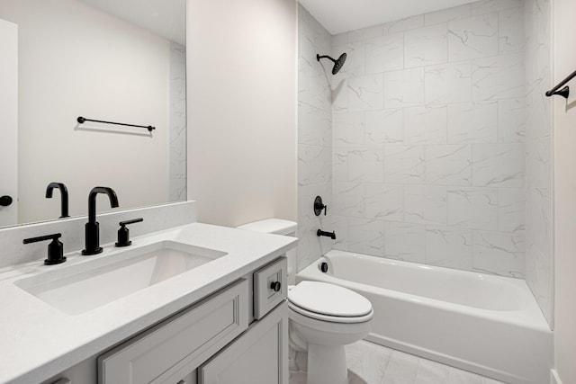 full bath featuring marble finish floor, bathing tub / shower combination, vanity, and toilet