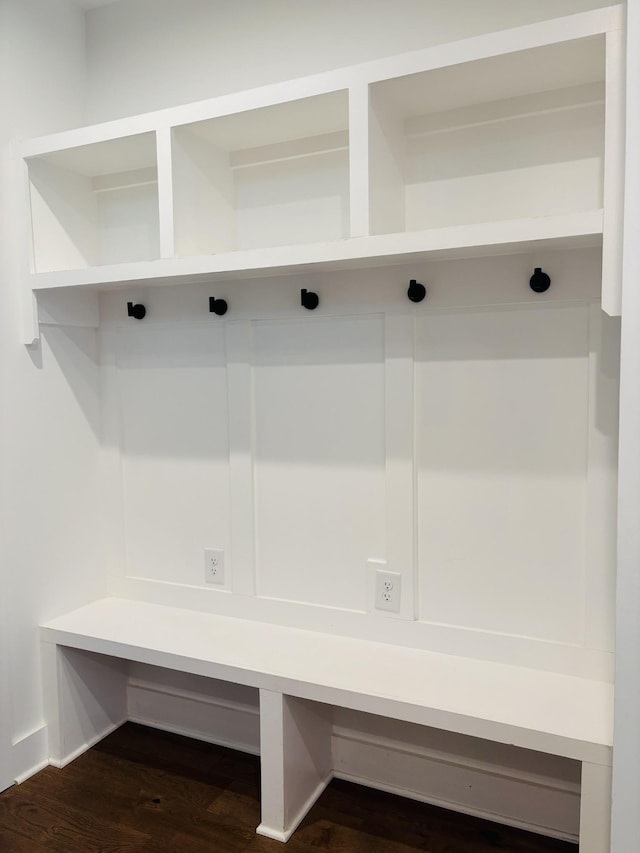 mudroom with dark wood-style flooring