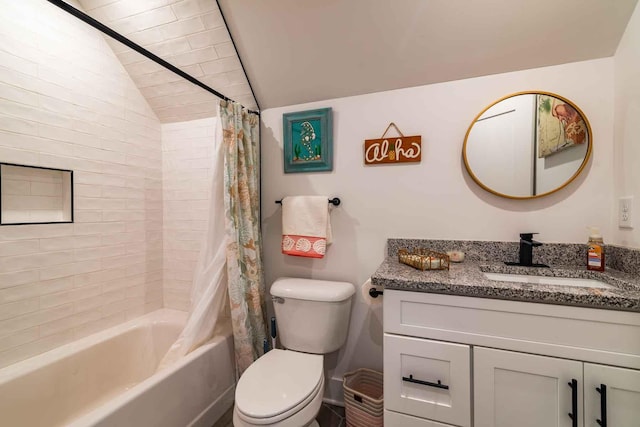 bathroom featuring toilet, vaulted ceiling, shower / bath combination with curtain, and vanity