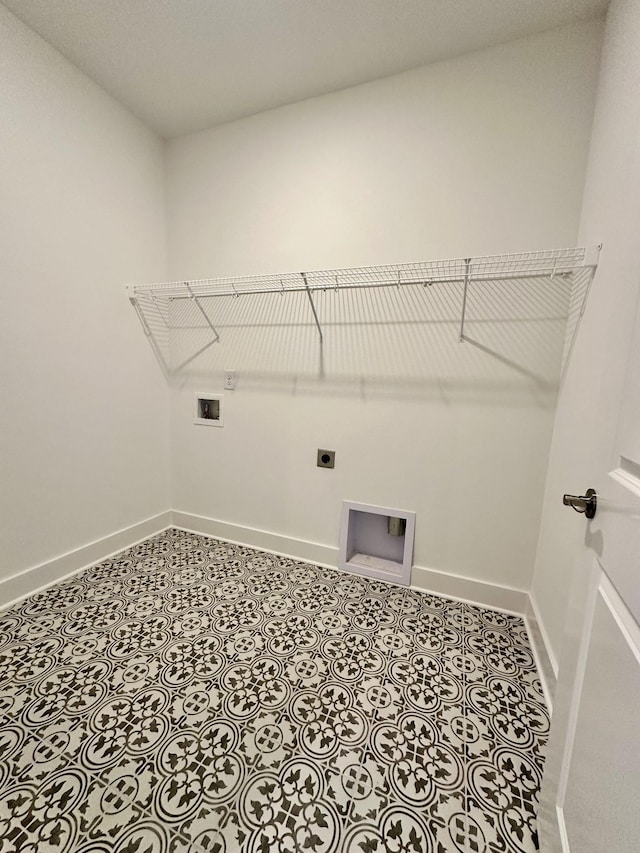 laundry room with light tile patterned floors, hookup for a washing machine, hookup for an electric dryer, laundry area, and baseboards