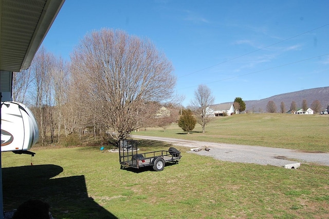 view of yard with a mountain view