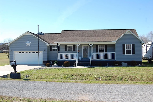 ranch-style house featuring covered porch, a front lawn, and concrete driveway