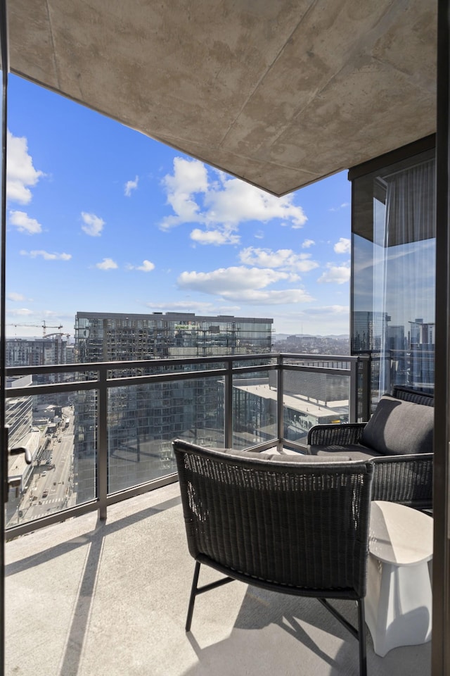 balcony featuring a view of city